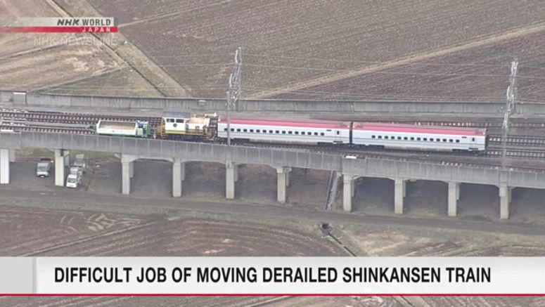 Work to move quake-hit derailed Shinkansen train begins