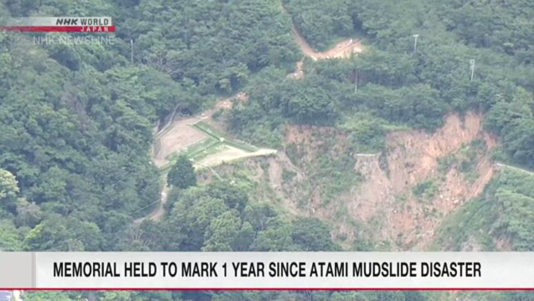 Bereaved gather in Atami one year after deadly mudslides