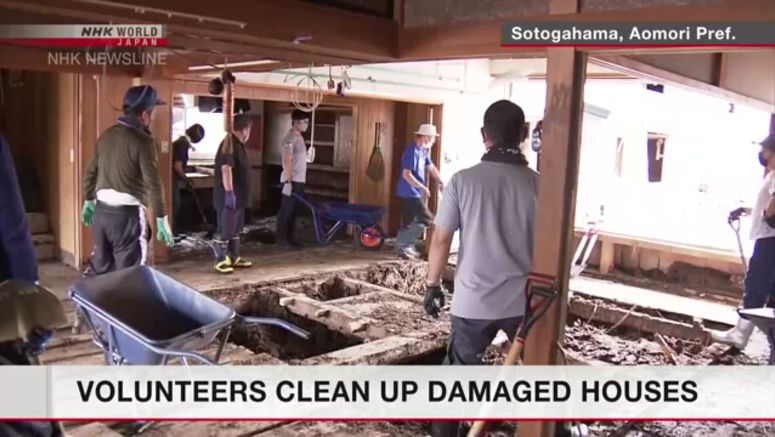 Volunteers help town in northern Japan recover from rain damage