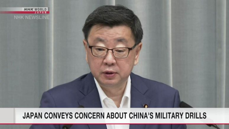 Japan conveys concern to China over military drill