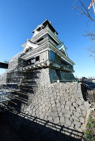 Kumamoto Castle's fortified curved stone walls rise again